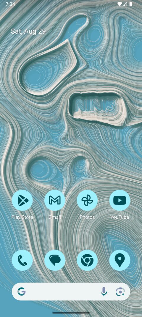 The same home screen with the word NINIS spelled out in trails in the middle of the piece.
